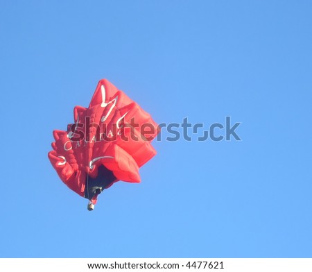 stock-photo-o-canada-hot-air-balloon-shaped-as-maple-leaf-the-symbol-of-canada-london-balloon-festival-4477621.jpg
