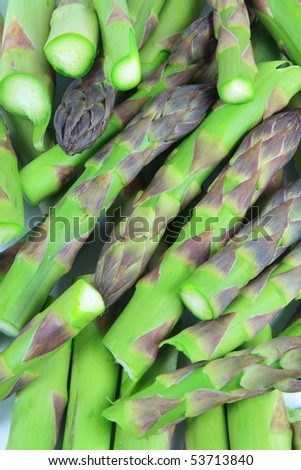 Group of snapped asparagus. Pictured pile of snapped asparagus ready to be cooked with pasta or in omelet (omelette).