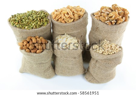 Nuts And Seeds. nuts and seeds over white