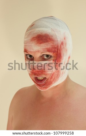 A woman with a bloody bondage on her face/Creepy girl
