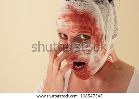 A woman with a bloody bandage on the head/Creepy girl