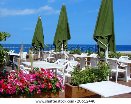 open restaurant on quay of the mediterranean sea in  Spain