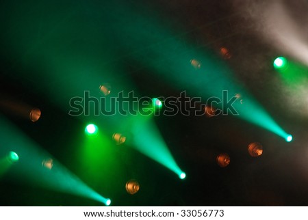 effect of a smoke and illumination on a scene during a musical concert