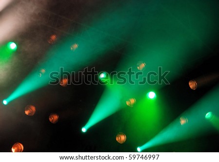 effect of a smoke and illumination on a scene during a musical concert