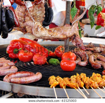 rabbit and meat with sausages prepare on a barbecue
