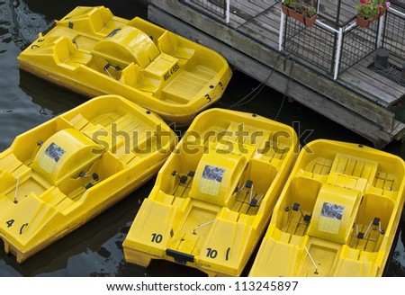 Group of yellow water bikes