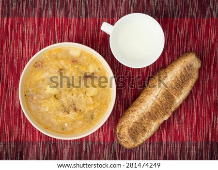 Cabbage soup with buttermilk and pastry. Food and drink.