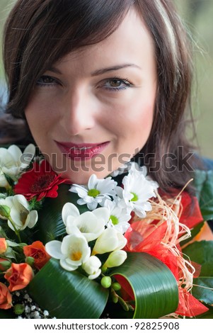 Woman face with flower bouquet