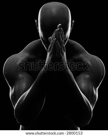 stock photo : Male figure rubbing hands together. High contrast lighting