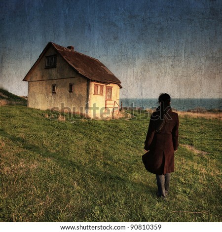 The little old house by the sea. Vintage conceptual image