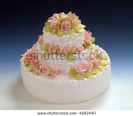 stock photo Beautiful multitiered wedding cake with white frosting