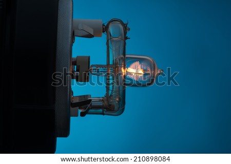 The internal structure of switched spotlight side view. Isolated on blue background