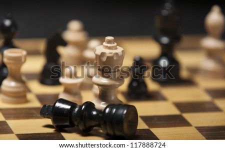 chess pieces on a chess board table