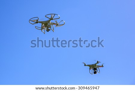 St.Louis Missouri. -August 24th : Editorial photo of a DJI Phantom 3 Professional drone in flight with a mounted 4k digital camera on August 24th 2015 in St.Louis Missouri over Blue sky