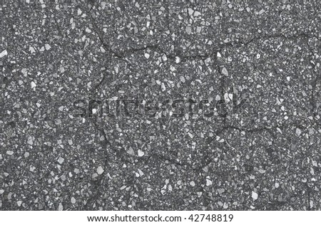 cracked road asphalt close up