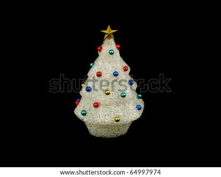 White christmas tree with ornaments made with recycled plastic isolated on black.