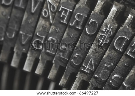 Old typewriter type focus on money symbol