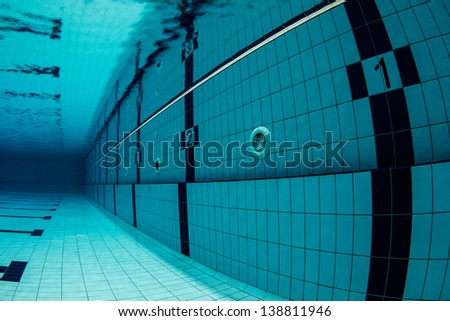 Sports Swimming Pool Underwater. Lanes Underwater, starting with number one. / Swimming Pool Underwater