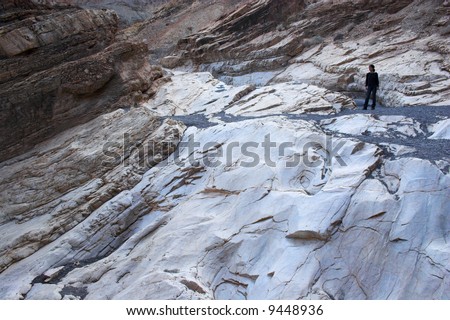 Blueish multicolored blue-pink clay and salt mineral deposits in geological formations of Death Valley National Park
