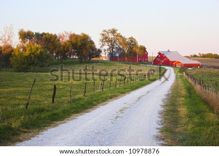 Roads in countryside surrounded by colorful fields and meadows