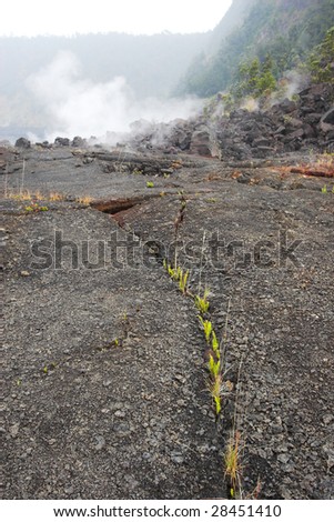 Barren bottom of Kilauea Crater with sulfur gases in Hawaii Volcanoes National Park