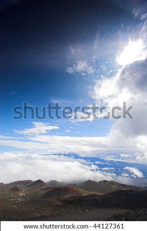 Barren volcanic landscape and blue sky in Hawaii