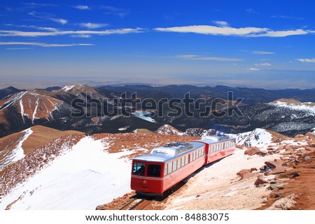 View of Pikes Peak and Manitou Springs Train on the top of Pikes Peak Mountain, Colorado, USA