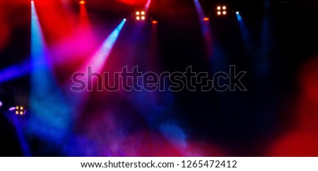 floodlights scene during a rock concert. Blurred background. Web banner. Element of design.