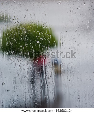 rain drops on window glass, cloudy day