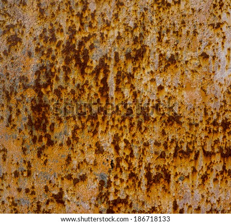 old rusty metal sheet covered with old paint residues