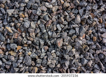 surface of the building crushed granite fines, closeup