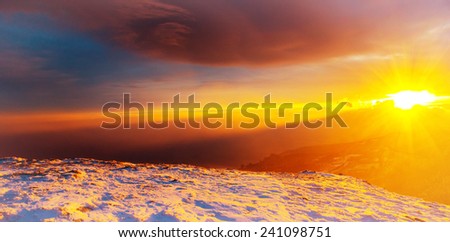 landscape in a mountainous area in the winter season, sunset, panorama