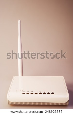 Wireless router on light background with clipping path