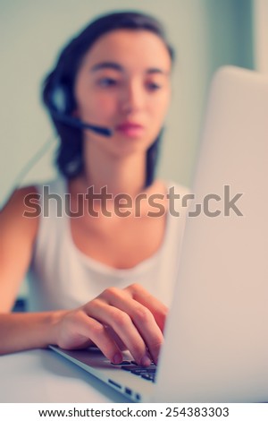 asian woman with headset