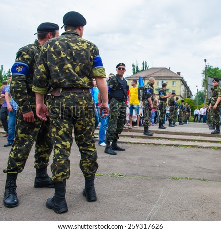 Kryvyi Rih, UKRAINE - MAY 17, 2014: Most rating Ukrainian presidential candidate Petro Poroshenko speaks at election meeting in Krivoy Rog (Kryvyi Rih or Krivoi Rog). Security.