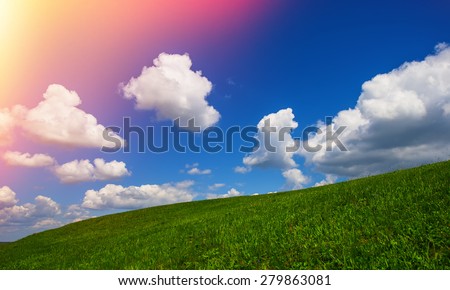 landscape with clouds green hills spring season