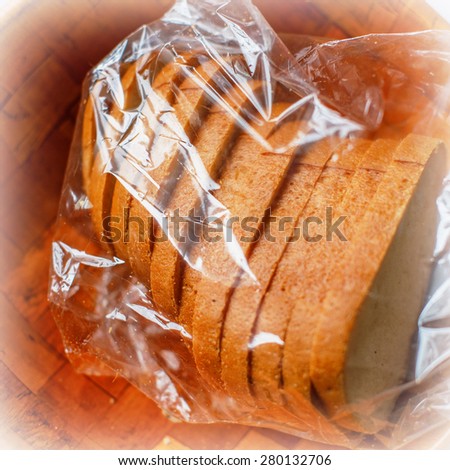 Fresh bread in the package, summer in the village