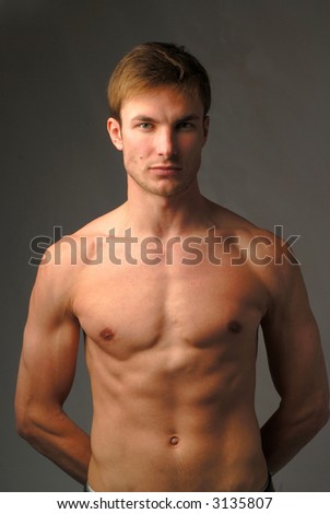 stock photo portrait young naked men which looks in chamber on dark 