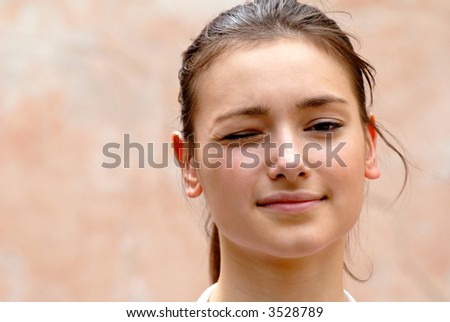 portrait of  young girl which has covered one eye