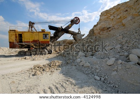 Dredge on loading in  sand-pit