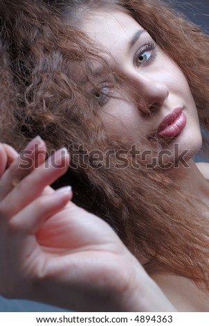 portrait of  young woman with  lifted hand