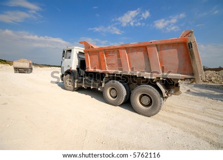 mining truck on blue on  background of  blue sky in career