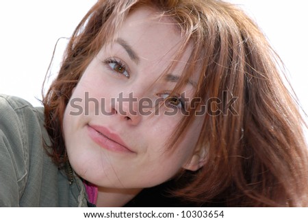 Portrait of  young girl in natural conditions,  close up