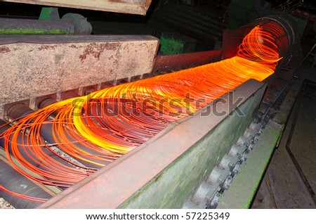 metallurgical production , a burning hot metal is stretched out through rollers