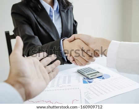 Business people shake hands for the first meet