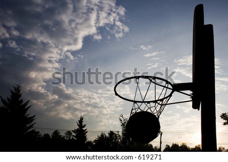 Silhouette of a basketball net