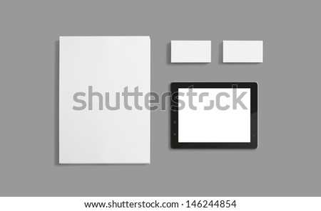 Blank Stationery Corporate ID Template isolated on grey. Consist of Business cards, Folder, Tablet PC, envelopes and smart phones.