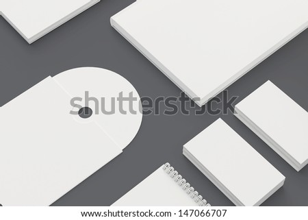 Blank Stationery isolated on wooden close view. Consist of Business cards, letterhead a4, notes, cd disk, book.