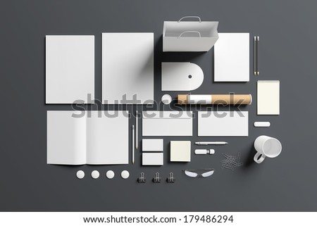 Blank stationery set isolated on grey. Consist of folder, note, magazine, bag, business cards, pencil, cd disk, buttons, envelopes, tubus.