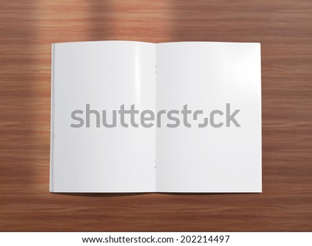 Blank opened brochure photo on wooden background to replace your design